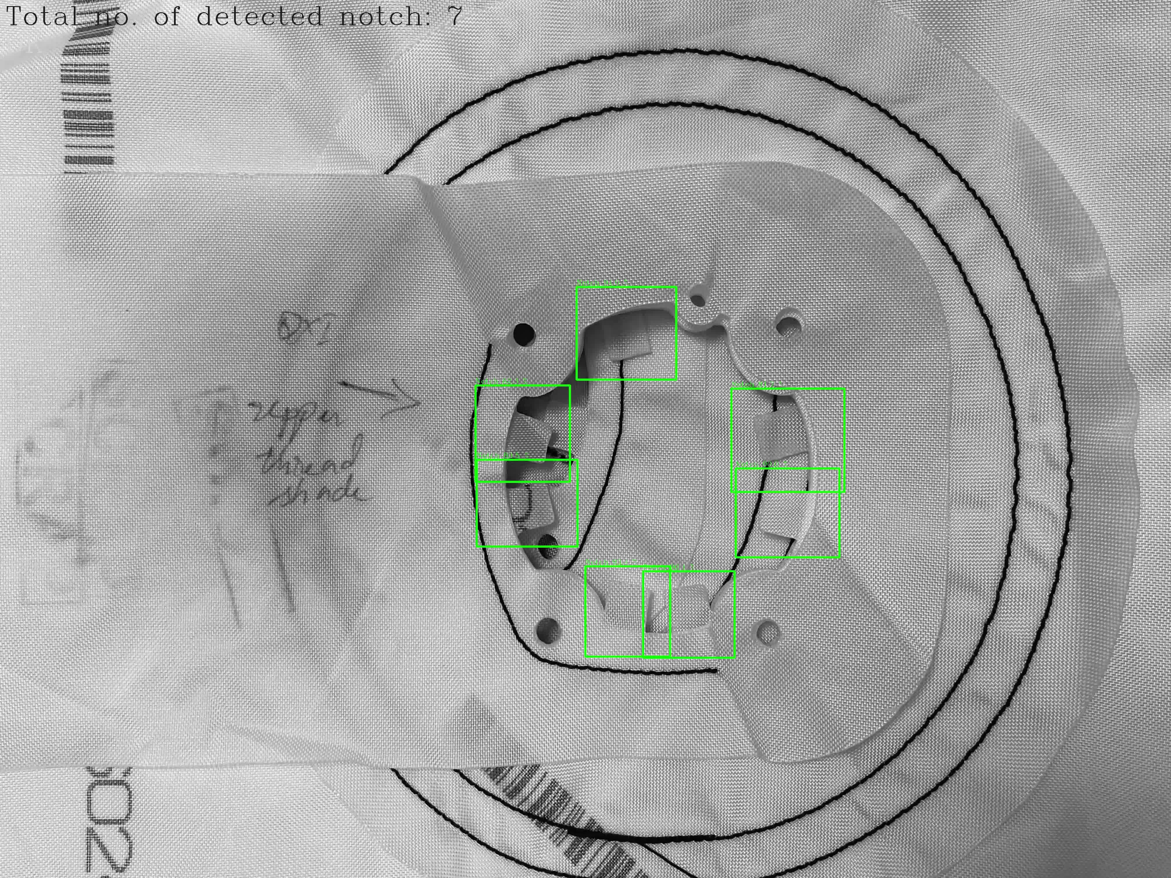 Detection view of a stitched bracket component with each notch boxed and counted, marked OK