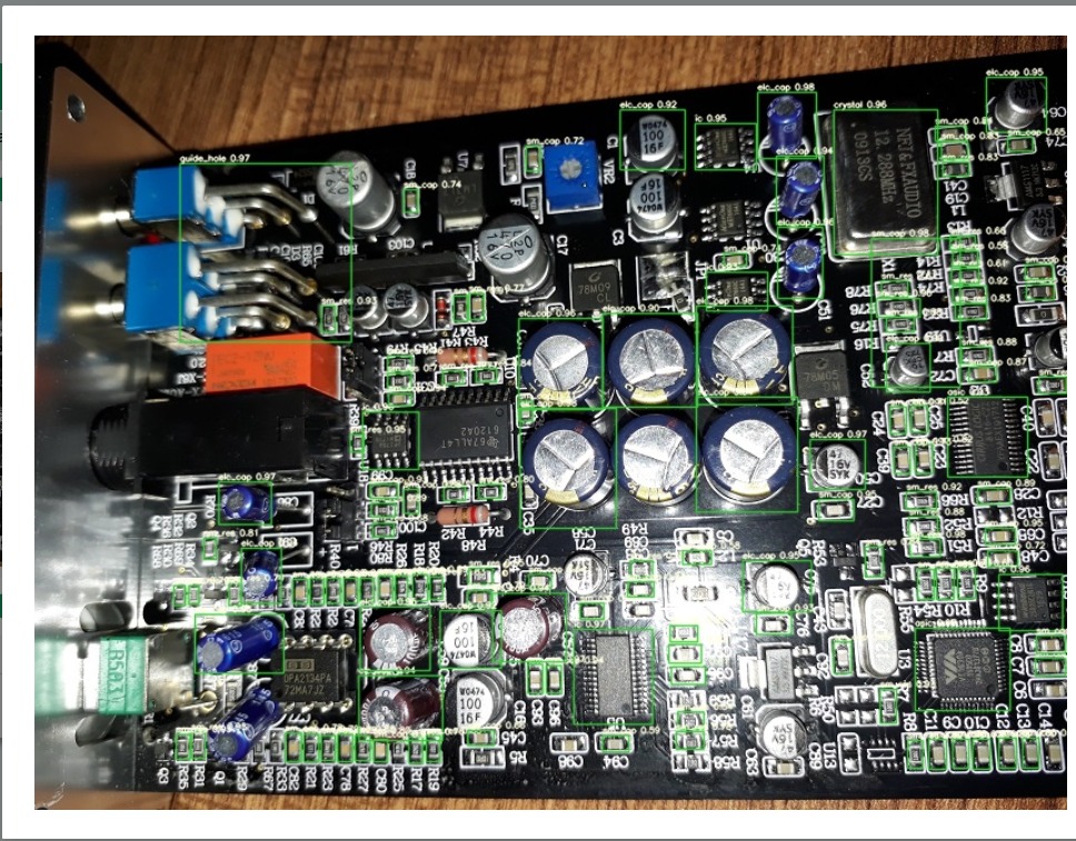 Detection view of a populated circuit board with every component boxed and confidence-scored