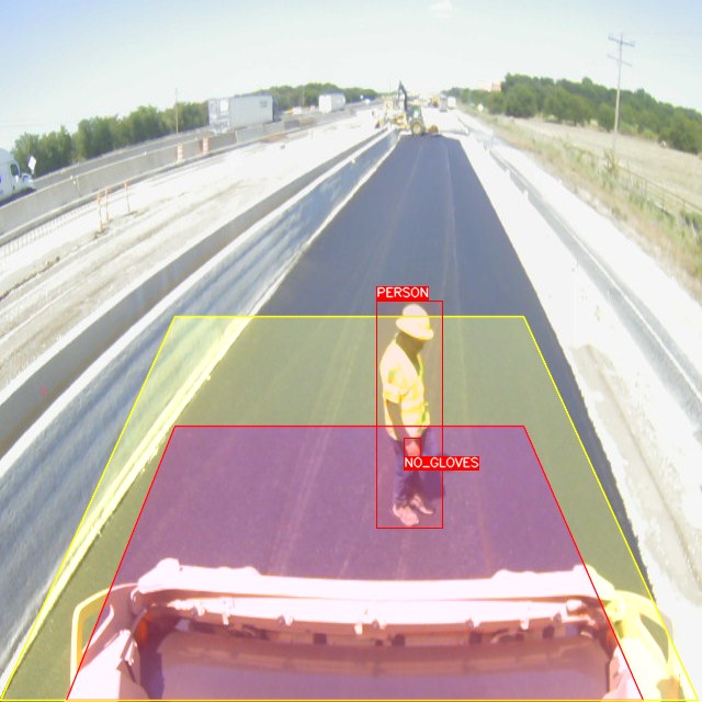 Paver camera view with a worker detected and boxed in the equipment's proximity zone on the roadway