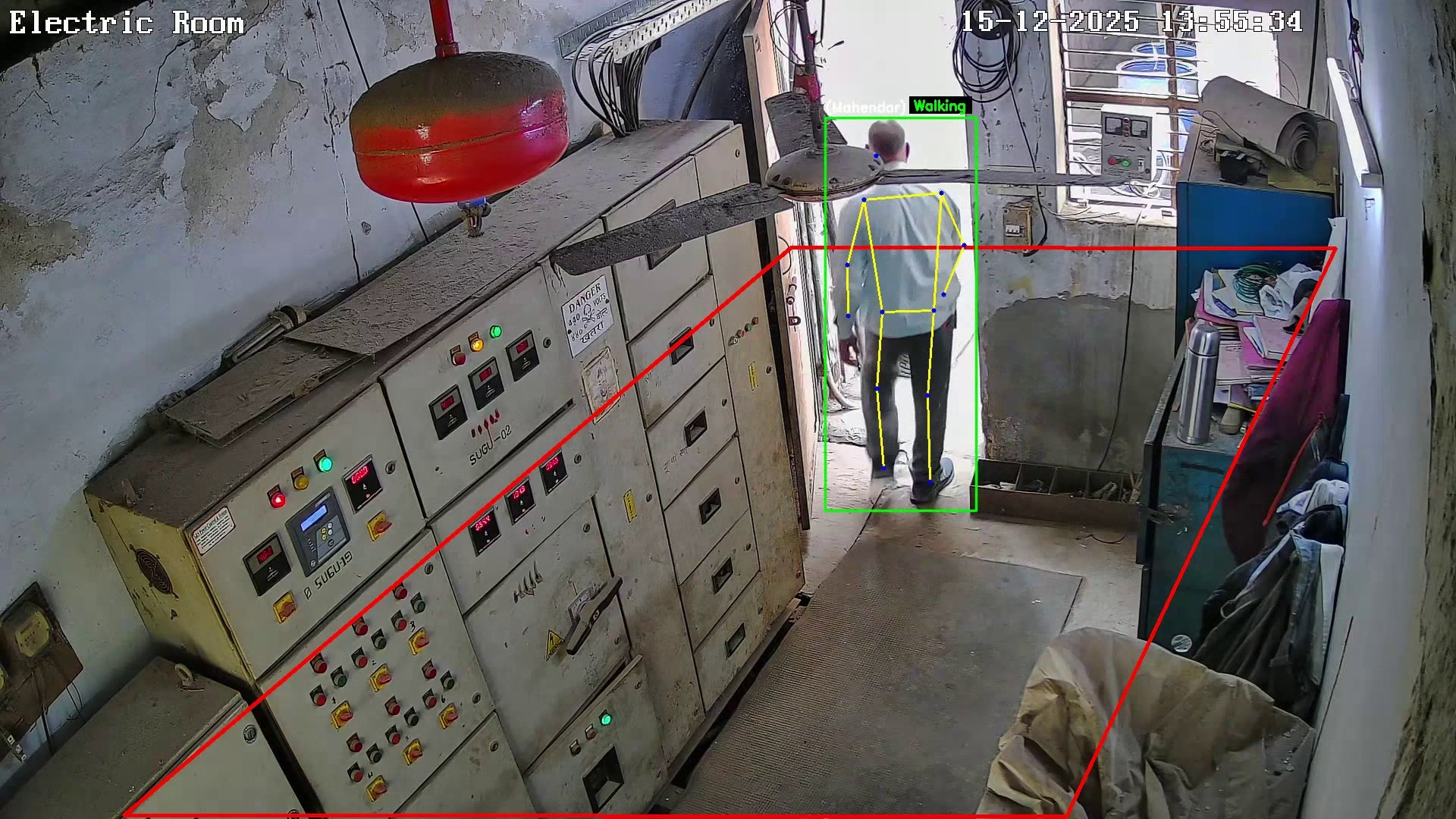 Person detected and tracked with a posture skeleton as they walk through a doorway beside a marked zone