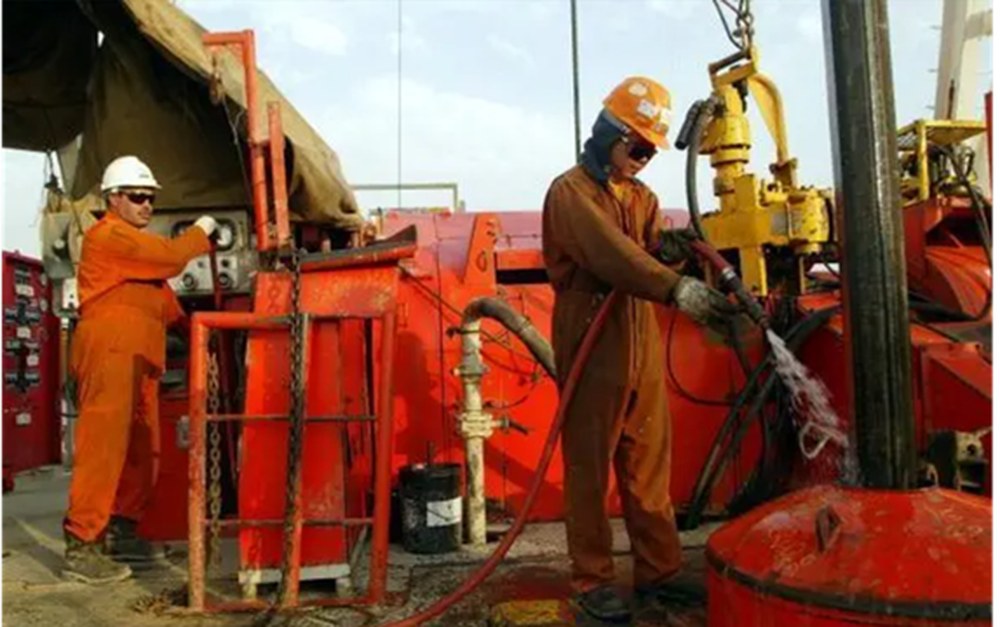 Workers on a drill floor with detection boxes drawn around each person