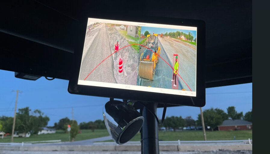 In-cab VICAS display showing the camera feed with the danger zone drawn and workers detected